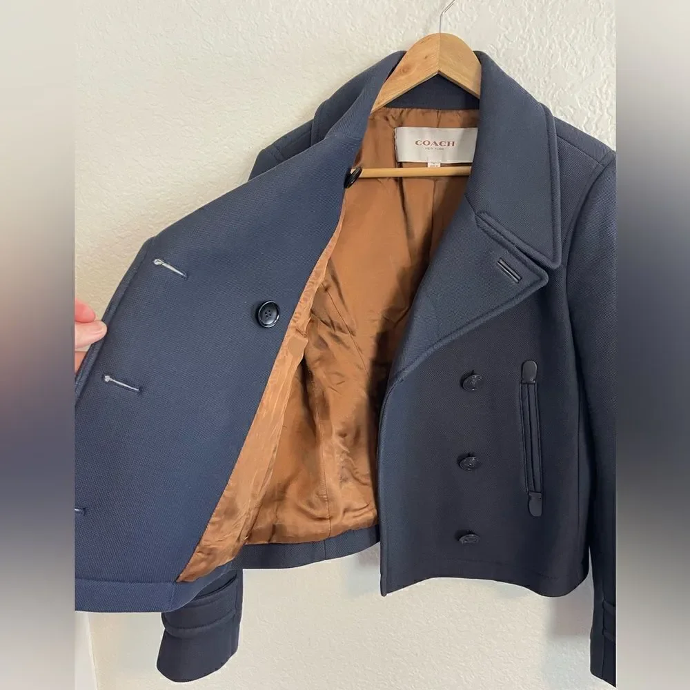 Coach Navy Peacoat with a nautical style. Medium